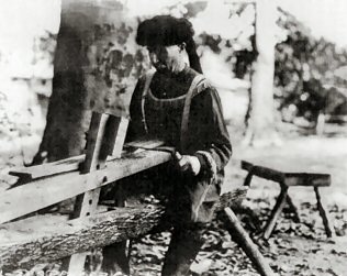Man with draw knife